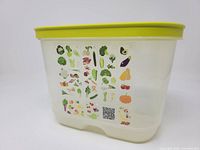 Side view of container showing produce guide and lid colour