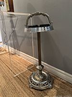 Full view of the chromed ashtray stand