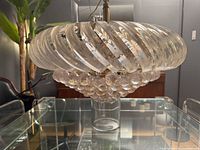 Side view showing spiral lucite blades and ball drops
