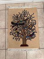 Full view of rug showing Tree of Life design, fringe, overall condition