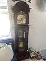 Full view of grandfather clock showing entire case