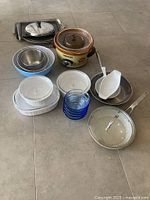 Group shot of all cookware, bowls, slow cooker, casseroles, tumblers