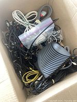 Overview of box showing modem and assorted cables