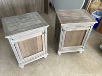 pair of rustic grey white-wash bedside tables front view