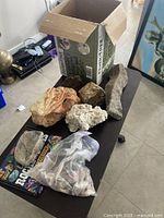 Full view of large rock specimens, bag of smaller pieces, kit insert and box