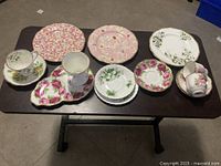 All items laid out on table showing variety and condition