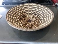 angled view of basket showing interior weave and rim
