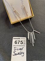 Necklace and earrings in box