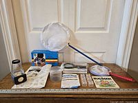 All items laid out together showing entire bug exploration kit