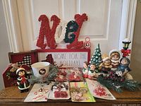 Full lot showing signs, figurines, tree, ornaments