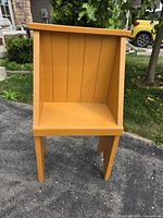 Front view of mustard yellow wooden bench chair cubby