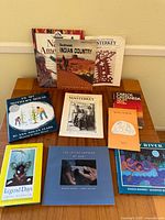 Group view of all books standing and laid out