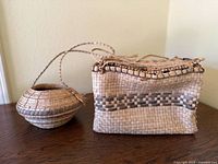 Round hanging basket and rectangular purse side by side
