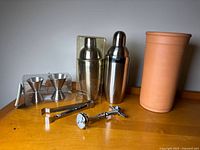 Group view of all barware and ceramic wine cooler