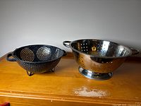 Both colanders side by side on surface
