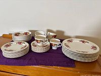 Full set showing stacks of plates, saucers and teacups