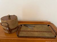 Ice bucket and serving tray side by side