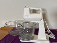 Mixer with both Fire-King bowls and beaters visible