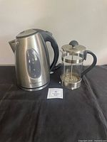 Electric kettle and French press together front view