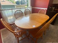 Dining set overview showing table and six chairs