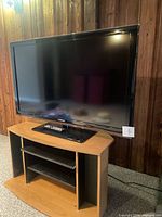 Front view of Samsung 46" TV on stand