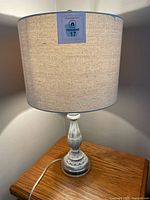 Lamp lit showing full view with shade