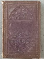 Front cover showing title embossing and wear