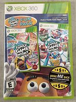 Front of Xbox 360 case showing Family Game Night Fun Pack cover