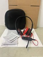 Headset, case, paperwork overview