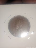 Obverse of 1913 Canadian large cent in 2x2 flip