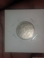 Reverse showing 5 Cents Canada and date 1927 in 2x2 flip