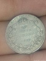 Reverse: crown, 10 CENTS CANADA 1929 within wreath