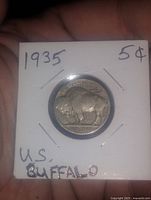 Reverse of 1935 Buffalo nickel in 2x2 flip showing bison design