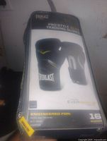Front of packaged Everlast Pro Style Elite Training Gloves