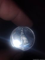 reverse side showing howling wolf and legend 50 CENTS CANADA 1867-1967