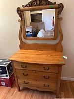 Full view of 3-drawer dresser with attached mirror