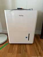 Front view of Danby white portable dehumidifier