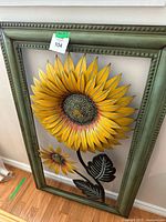 Full view of framed 3D sunflower sculpture showing frame color and overall design