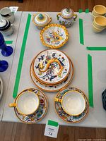 Full lot showing all pieces arranged on table