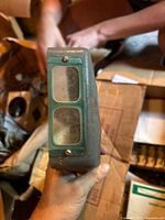 Gray metal viewer with twin windows