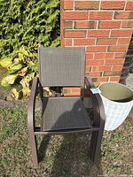 Single patio sling armchair front view