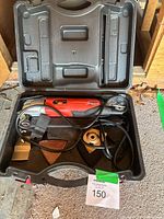 Multi-tool kit inside open carrying case