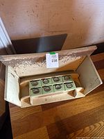 Cabinet on side showing all eight drawers inserted