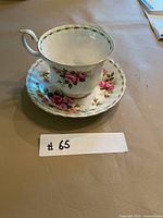 Teacup on saucer showing pattern and form