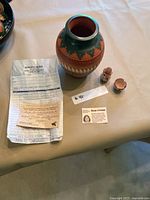 Large etched vase with paperwork and two mini pots