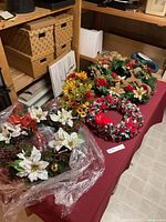 Tabletop view of all wreaths and bouquet