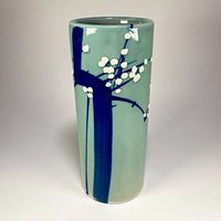 Front view of porcelain vase showing pussy willow design