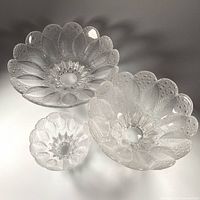All three crystal bowls grouped to show size differences and pattern
