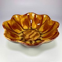 Top angle showing scalloped rim and flow glaze