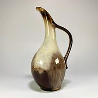 Front view of Carstens ewer vase showing gradient glaze and handle
